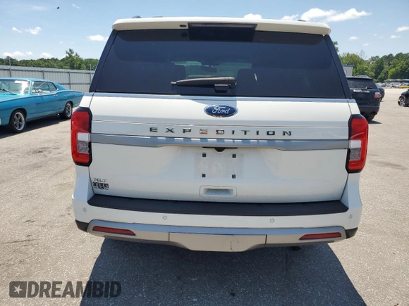 2022 Ford Expedition XLT with VIN 1FMJU1HT7NEA32284, listed as a Copart auction lot 61498915 with 23,510 mi miles and Salvage title. Bid and sale history available at DreamBid. Image 6.