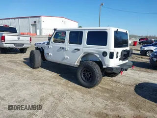 2022 Jeep Wrangler Unlimited Rubicon z VIN 1C4JJXFGXNW121489, wystawiony jako IAAI lot #41749550 z przebiegiem 56 601 mil mil oraz . Historia ofert i sprzedaży dostępna na DreamBid. Obrazek 3.