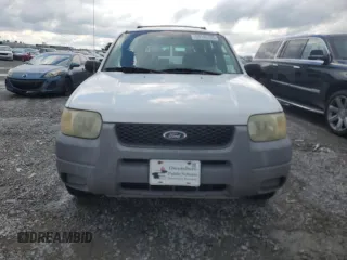 2001 Ford Escape XLS with VIN 1FMYU02161KB01283, listed as a Copart auction lot 59145105 with 86,195 mi miles and Salvage title. Bid and sale history available at DreamBid. Image 5.