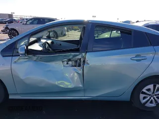 2018 Toyota Prius Two with VIN JTDKBRFUXJ3066430, listed as a IAAI auction lot 42034812 with 119,711 mi miles and . Bid and sale history available at carsss.com. Image 14.