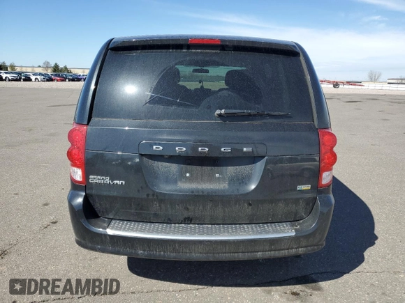2014 Dodge Grand Caravan SE with VIN 2C4RDGBG2ER341797, listed as a Copart auction lot 49439405 with 102,633 mi miles and Salvage Title. Bid and sale history available at DreamBid. Image 6.