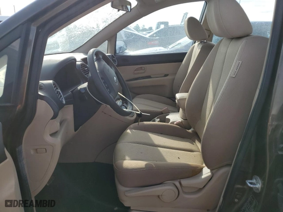 2009 Kia Rondo LX Base with VIN KNAFG528397257483, listed as a Copart auction lot 73800174 with 0 mi miles and Salvage Title. Bid and sale history available at carsss.com. Image 7.