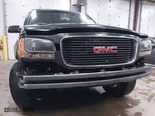 2000 GMC Denali with VIN 1GKEK13R9YR163824, listed as a IAAI auction lot 41245808 with 206,773 mi miles. Bid and sale history available at carsss.com. Image 6.