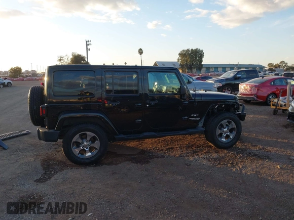 2018 Jeep Wrangler JK Unlimited Sahara with VIN 1C4HJWEG0JL810480, listed as a IAAI auction lot 41260609 with 69,776 mi miles. Bid and sale history available at carsss.com. Image 14.