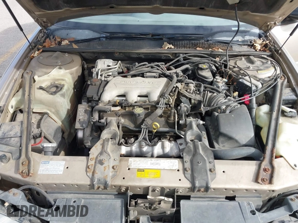 1997 Oldsmobile Cutlass Supreme S z VIN 1G3WH52M4VF303898, wystawiony jako IAAI lot #41853372 z przebiegiem 125 239 mil mil oraz . Historia ofert i sprzedaży dostępna na DreamBid. Obrazek 10.