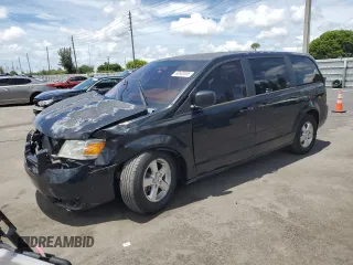 2009 Dodge Grand Caravan SE with VIN 2D8HN44E39R576283, listed as a Copart auction lot 60653555 with 166,735 mi miles and Salvage title. Bid and sale history available at DreamBid. Image 1.