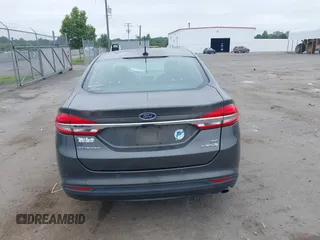 2017 Ford Fusion Hybrid SE with VIN 3FA6P0LU2HR301083, listed as a IAAI auction lot 42602798 with 89,003 mi miles and . Bid and sale history available at DreamBid. Image 16.