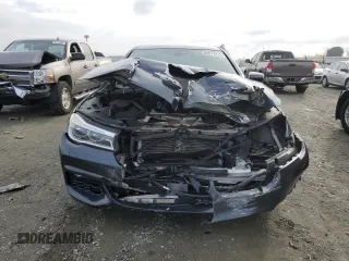 2016 BMW 7 Series 750i with VIN WBA7F0C5XGGM20402, listed as a Copart auction lot 86011914 with 90,123 mi miles and Salvage Title. Bid and sale history available at carsss.com. Image 5.