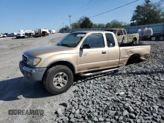 1999 Toyota Tacoma z VIN 4TAWN72N5XZ418522, wystawiony jako Copart lot #51940615 z przebiegiem 340 432 mil mil oraz Szkoda całkowita • Salvage title. Historia ofert i sprzedaży dostępna na DreamBid. Obrazek 1.