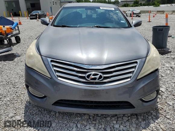 2013 Hyundai Azera z VIN KMHFG4JG9DA254147, wystawiony jako Copart lot #64744425 z przebiegiem 173 015 mil mil oraz Szkoda całkowita • Salvage title. Historia ofert i sprzedaży dostępna na DreamBid. Obrazek 5.