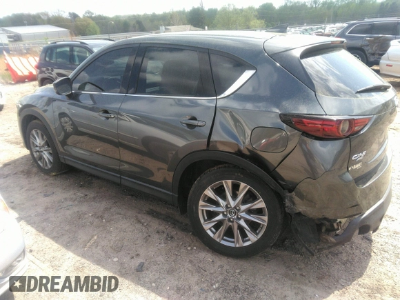 2019 Mazda CX-5 Grand Touring with VIN JM3KFBDM7K0606860, listed as a IAAI auction lot 41936338 with 93,057 mi miles. Bid and sale history available at carsss.com. Image 3.