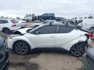 2020 Toyota C-HR LE with VIN JTNKHMBX9L1092934, listed as a IAAI auction lot 42021972 with 56,777 mi miles and . Bid and sale history available at DreamBid. Image 14.