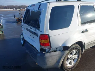 2005 Ford Escape XLT with VIN 1FMYU931X5KA84738, listed as a IAAI auction lot 41663564 with 140,903 mi miles. Bid and sale history available at carsss.com. Image 13.