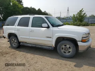 2002 Chevrolet Tahoe LT z VIN 1GNEK13Z32J217370, wystawiony jako Copart lot #59101035 z przebiegiem 225 247 mil mil oraz Czysty tytuł • Clean title. Historia ofert i sprzedaży dostępna na DreamBid. Obrazek 4.