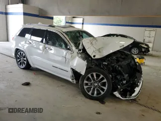 2017 Jeep Grand Cherokee Overland with VIN 1C4RJFCG1HC842890, listed as a Copart auction lot 63395045 with Not provided miles and Salvage title. Bid and sale history available at DreamBid. Image 4.