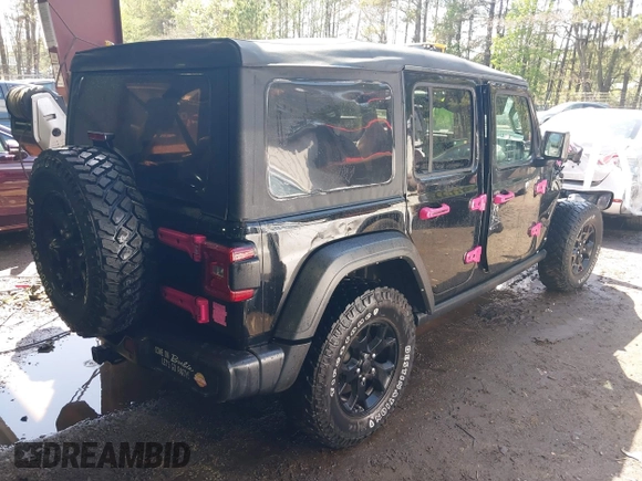 2021 Jeep Wrangler Unlimited Sport S with VIN 1C4HJXDG7MW714968, listed as a IAAI auction lot 41983752 with 50,980 mi miles. Bid and sale history available at carsss.com. Image 4.
