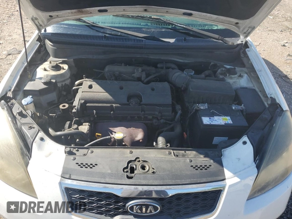 2010 Kia Rio LX with VIN KNADH4A31A6635895, listed as a Copart auction lot 61308434 with 209,016 mi miles and Salvage Title. Bid and sale history available at carsss.com. Image 11.