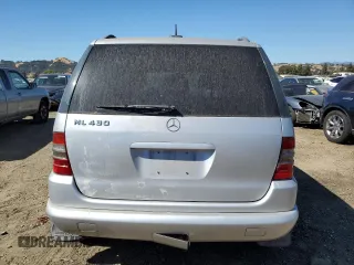 2000 Mercedes-Benz M-Class with VIN 4JGAB72E5YA173269, listed as a Copart auction lot 71520714 with 239,248 mi miles and Clean Title. Bid and sale history available at carsss.com. Image 6.