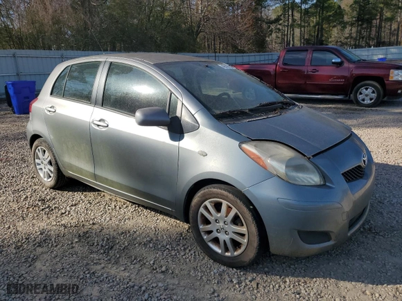 2009 Toyota Yaris with VIN JTDKT903X95240915, listed as a Copart auction lot 49143135 with 188,817 mi miles and Clean Title. Bid and sale history available at carsss.com. Image 4.