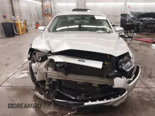 2016 Ford Fusion SE Hybrid z VIN 3FA6P0LU1GR304166, wystawiony jako IAAI lot #41932720 z przebiegiem 68 058 mil mil oraz . Historia ofert i sprzedaży dostępna na DreamBid. Obrazek 13.