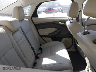 2012 Ford Focus SEL with VIN 1FAHP3H23CL183151, listed as a IAAI auction lot 41800487 with 165,370 mi miles. Bid and sale history available at carsss.com. Image 8.