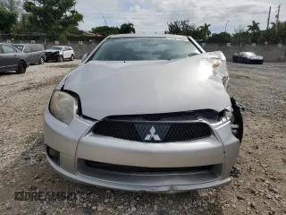 2009 Mitsubishi Eclipse GS with VIN 4A3AK24F49E029698, listed as a Copart auction lot 73087504 with 87,284 mi miles and Salvage Title. Bid and sale history available at carsss.com. Image 5.