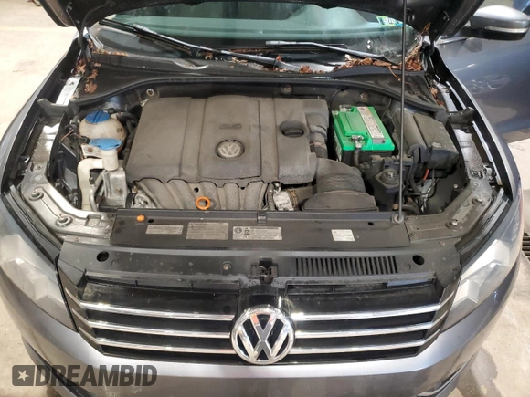 2012 Volkswagen Passat SE z VIN 1VWBP7A39CC080551, wystawiony jako Copart lot #57606895 z przebiegiem 154 965 mil mil oraz Czysty tytuł • Clean title. Historia ofert i sprzedaży dostępna na DreamBid. Obrazek 11.