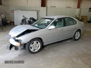 2000 Nissan Altima GXE z VIN 1N4DL01A1YC125718, wystawiony jako Copart lot #57508975 z przebiegiem 200 598 mil mil oraz Szkoda całkowita • Salvage title. Historia ofert i sprzedaży dostępna na DreamBid. Obrazek 1.