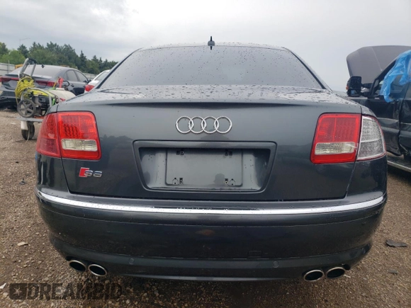 2007 Audi S8 z VIN WAUPN44E87N017815, wystawiony jako Copart lot #60161364 z przebiegiem Nie podano mil oraz Szkoda całkowita • Salvage title. Historia ofert i sprzedaży dostępna na DreamBid. Obrazek 6.
