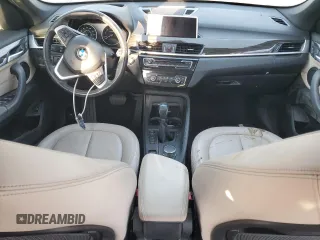 2017 BMW X1 sDrive28i with VIN WBXHU7C39H5H35490, listed as a Copart auction lot 75499974 with 0 mi miles and Salvage Title. Bid and sale history available at carsss.com. Image 8.