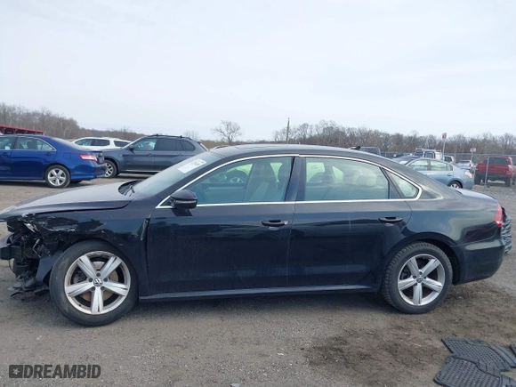 2012 Volkswagen Passat SE with VIN 1VWBP7A37CC021336, listed as a IAAI auction lot 41724459 with 124,832 mi miles. Bid and sale history available at carsss.com. Image 13.