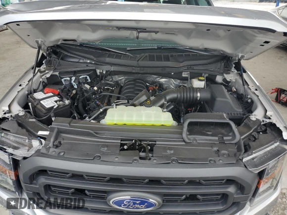 2023 Ford F-150 XL with VIN 1FTMF1C57PKF86630, listed as a Copart auction lot 59172785 with 14,840 mi miles and Salvage title. Bid and sale history available at DreamBid. Image 11.