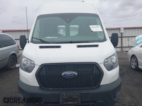 2021 Ford Transit Cargo with VIN 1FTBR1X83MKA49560, listed as a IAAI auction lot 41657997 with 44,518 mi miles and . Bid and sale history available at DreamBid. Image 12.