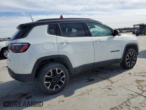 2020 Jeep Compass Trailhawk with VIN 3C4NJDDB3LT189398, listed as a Copart auction lot 88671285 with 75,672 mi miles and Salvage title. Bid and sale history available at DreamBid. Image 3.