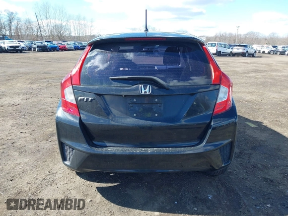 2015 Honda Fit LX z VIN 3HGGK5H51FM775176, wystawiony jako IAAI lot #41690648 z przebiegiem 49 979 mil mil oraz . Historia ofert i sprzedaży dostępna na DreamBid. Obrazek 16.