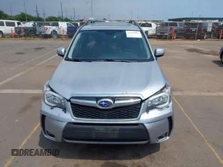 2016 Subaru Forester XT Touring with VIN JF2SJGXC7GH491999, listed as a IAAI auction lot 41907092 with 104,923 mi miles and . Bid and sale history available at DreamBid. Image 12.