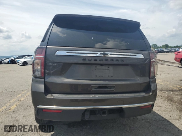 2021 Chevrolet Suburban LS with VIN 1GNSKBED0MR300723, listed as a Copart auction lot 65056755 with 58,497 mi miles and Salvage title. Bid and sale history available at DreamBid. Image 6.