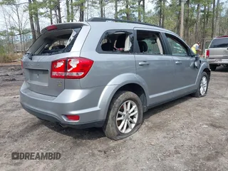 2015 Dodge Journey SXT with VIN 3C4PDCBG5FT696882, listed as a IAAI auction lot 41848362 with 175,039 mi miles and . Bid and sale history available at DreamBid. Image 4.