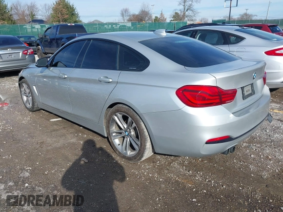 2018 BMW 4 Series 430i with VIN WBA4J1C56JBG80262, listed as a IAAI auction lot 41451833 with 148,487 mi miles and . Bid and sale history available at carsss.com. Image 3.