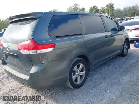 2014 Toyota Sienna L with VIN 5TDZK3DC6ES421278, listed as a IAAI auction lot 41178679 with 202,823 mi miles. Bid and sale history available at carsss.com. Image 4.