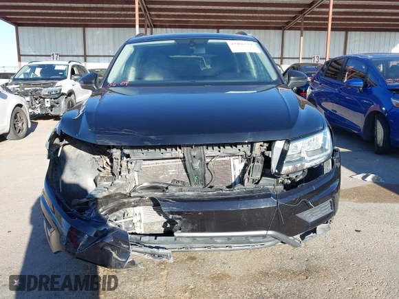 2021 Volkswagen Tiguan SE z VIN 3VV3B7AX0MM080853, wystawiony jako IAAI lot #42406539 z przebiegiem 73 295 mil mil oraz . Historia ofert i sprzedaży dostępna na DreamBid. Obrazek 13.