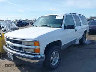 1997 Chevrolet Suburban with VIN 3GNFK16R4VG126095, listed as a IAAI auction lot 41548470 with 290,502 mi miles. Bid and sale history available at carsss.com. Image 2.