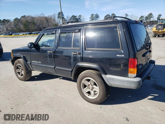 2000 Jeep Cherokee Classic with VIN 1J4FF58S3YL171454, listed as a Copart auction lot 42945485 with 218,721 mi miles and Salvage Title. Bid and sale history available at carsss.com. Image 2.