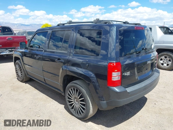 2014 Jeep Patriot Latitude with VIN 1C4NJPFA0ED848908, listed as a IAAI auction lot 41994006 with 131,122 mi miles and . Bid and sale history available at carsss.com. Image 3.