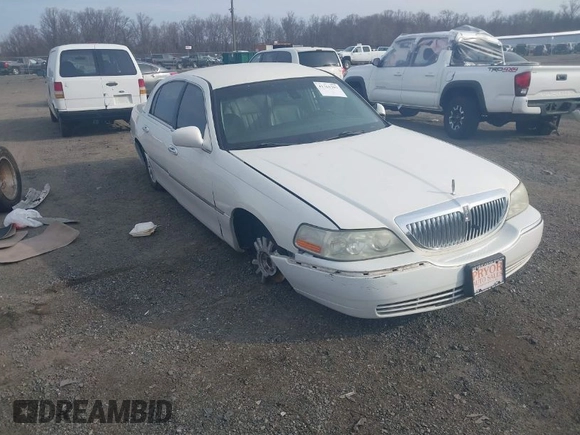 2003 Lincoln Town Car Signature z VIN 1LNHM82W33Y615344, wystawiony jako IAAI lot #41761302 z przebiegiem Nie podano mil oraz . Historia ofert i sprzedaży dostępna na DreamBid. Obrazek 1.