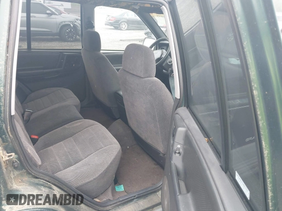 1996 Jeep Grand Cherokee Laredo with VIN 1J4GZ58S6TC333856, listed as a IAAI auction lot 42504895 with 176,955 mi miles and . Bid and sale history available at DreamBid. Image 8.