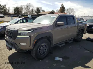 2023 Nissan Frontier Pro-4X with VIN 1N6ED1EK2PN634253, listed as a Copart auction lot 48523695 with 28,138 mi miles and Salvage title. Bid and sale history available at DreamBid. Image 1.