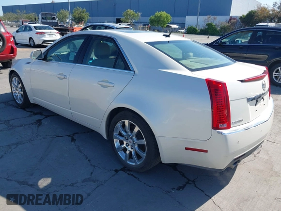 2008 Cadillac CTS RWD z VIN 1G6DV57V280142396, wystawiony jako IAAI lot #42086055 z przebiegiem 183 113 mil mil oraz . Historia ofert i sprzedaży dostępna na DreamBid. Obrazek 3.