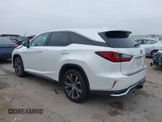 2018 Lexus RX 350L Premium z VIN JTJDZKCAXJ2010125, wystawiony jako IAAI lot #41899420 z przebiegiem 113 995 mil mil oraz . Historia ofert i sprzedaży dostępna na DreamBid. Obrazek 3.