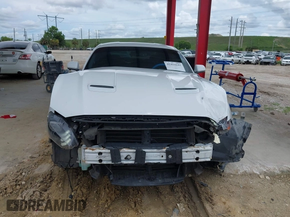 2018 Ford Mustang EcoBoost with VIN 1FA6P8TH4J5165145, listed as a IAAI auction lot 42414241 with 58,884 mi miles and . Bid and sale history available at DreamBid. Image 13.